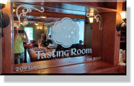 Etched on 1/4" Mirror and Installed by Custom Glass Etching.