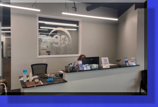 Behind Reception Desk Glass Pieces for all 3D locations have been Etched by Custom Glass Etching.
